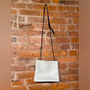 Black and White DKNY leather crossbody bag.
